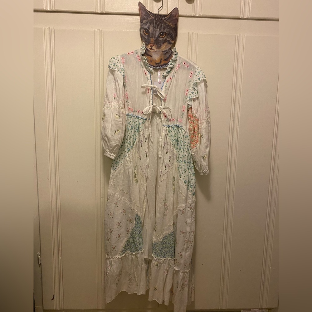 Fillyboo carnival duster in color “lagoon” size large. Mint condition